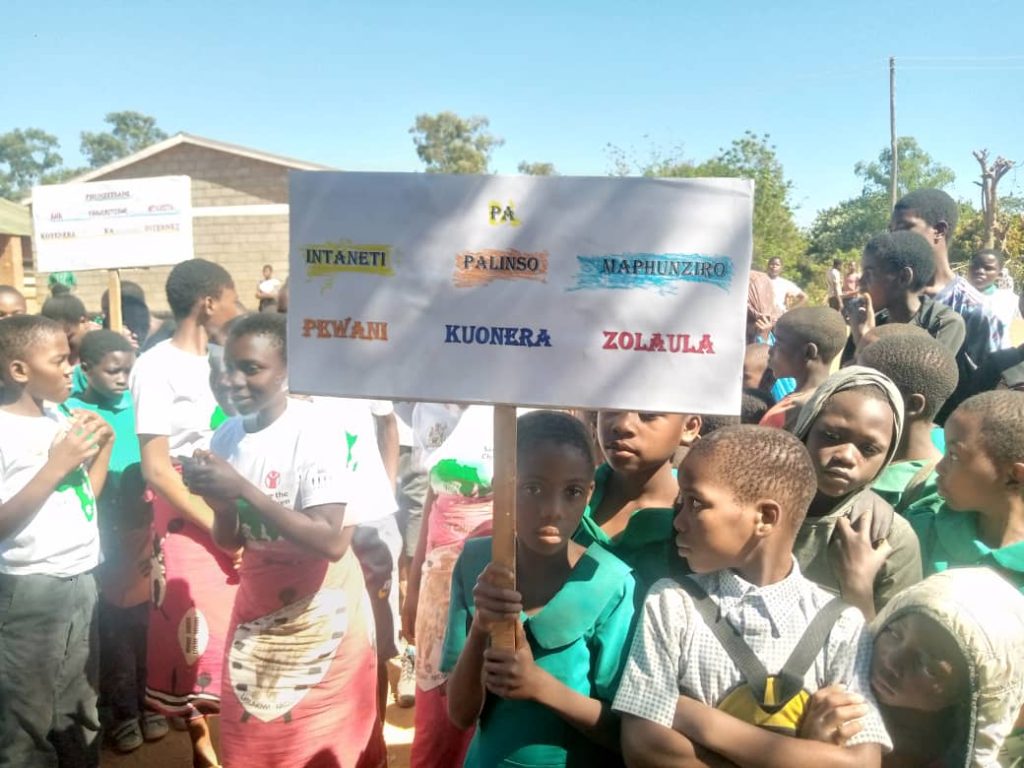 A child carry a placard during the commemoration