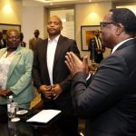 President Chakwera (back to camera) saluting SA-based Malawians investors after the audience