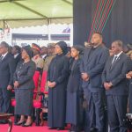 President Chakwera (far left), widow Mary Chilima, Chilima's children and others at the funeral ceremony at Bingu National Stadium