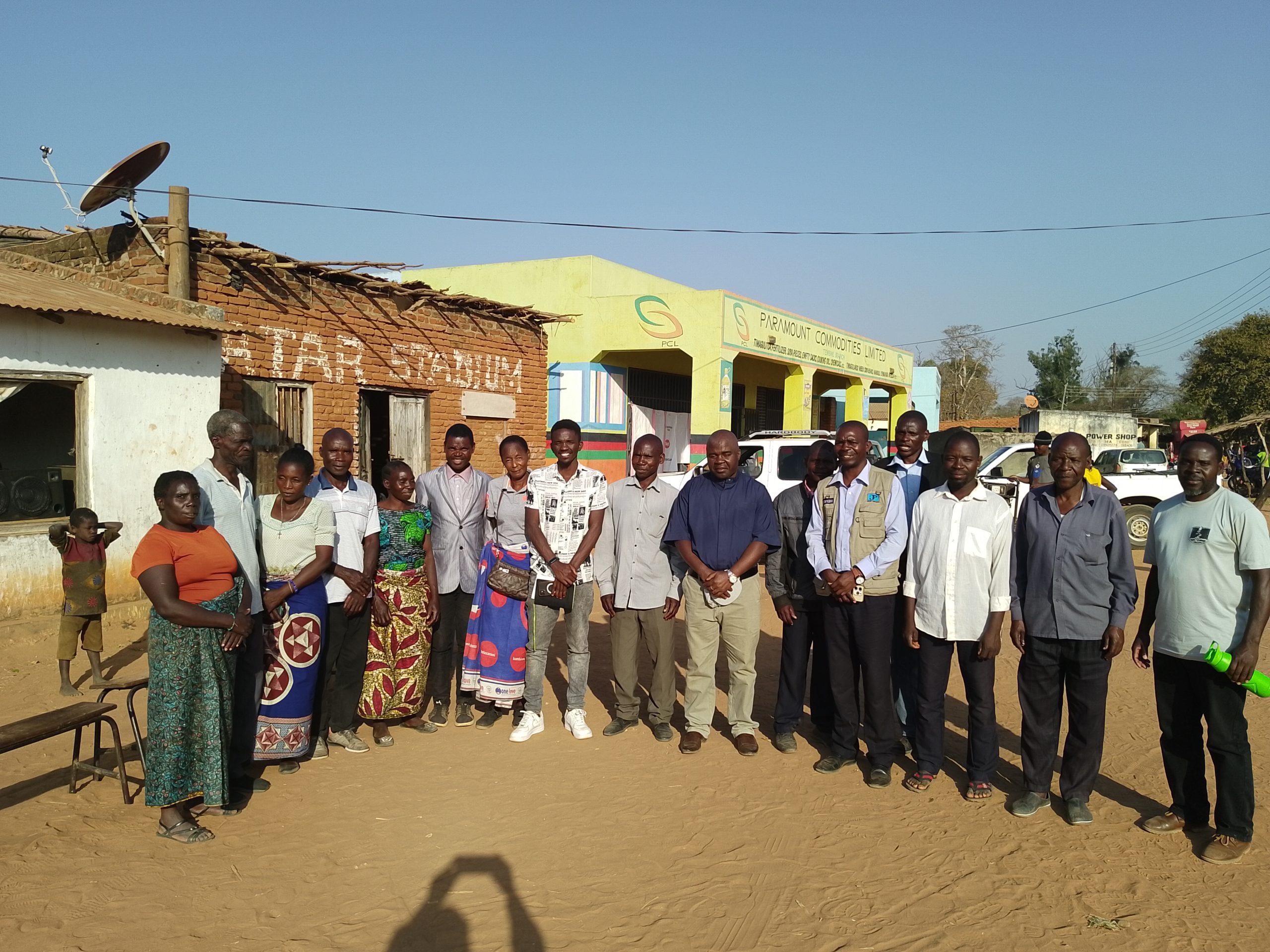CCJP officials posing for a photo with traditional and community leaders at Tembwe Trading Centre after the whistle stop tour scaled