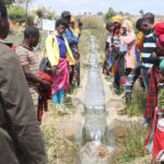 Farmers appreciating water flow at Malindinda irrigation scheme-Pic by Steve Chirombo, MANA