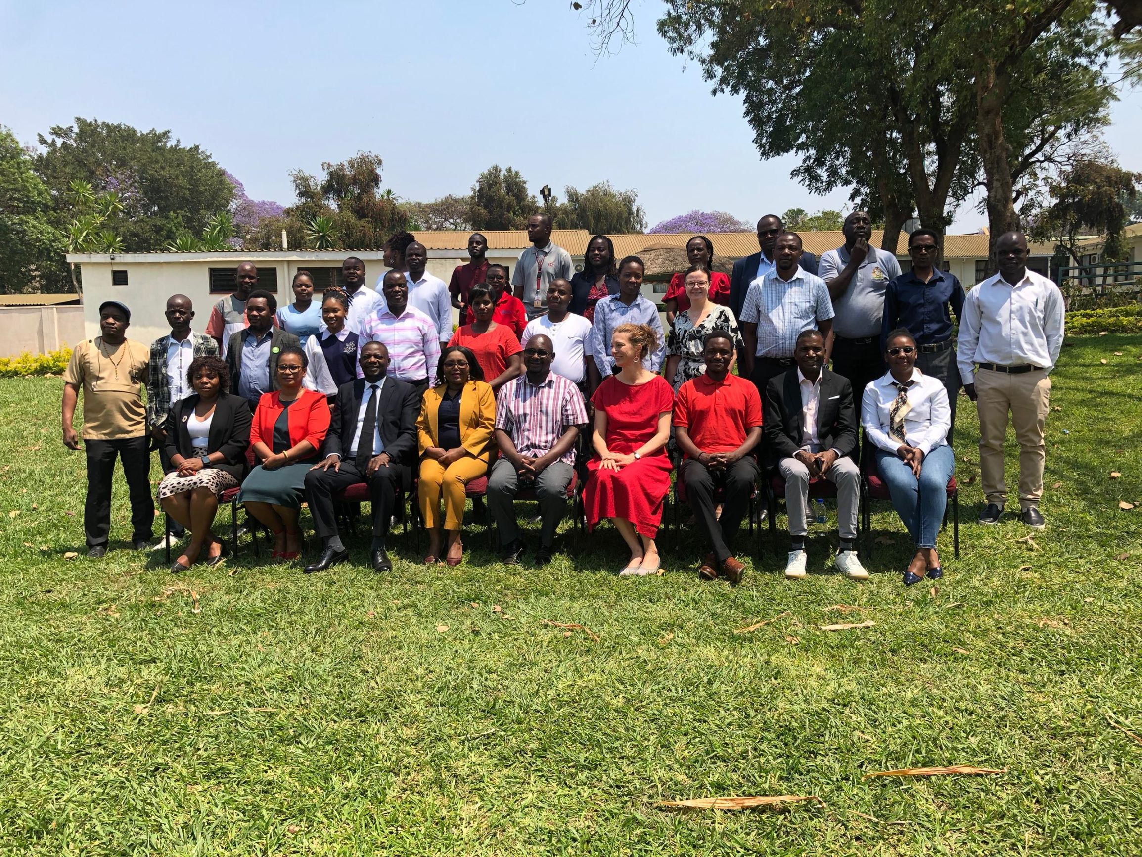 Stakeholders posing for a photo