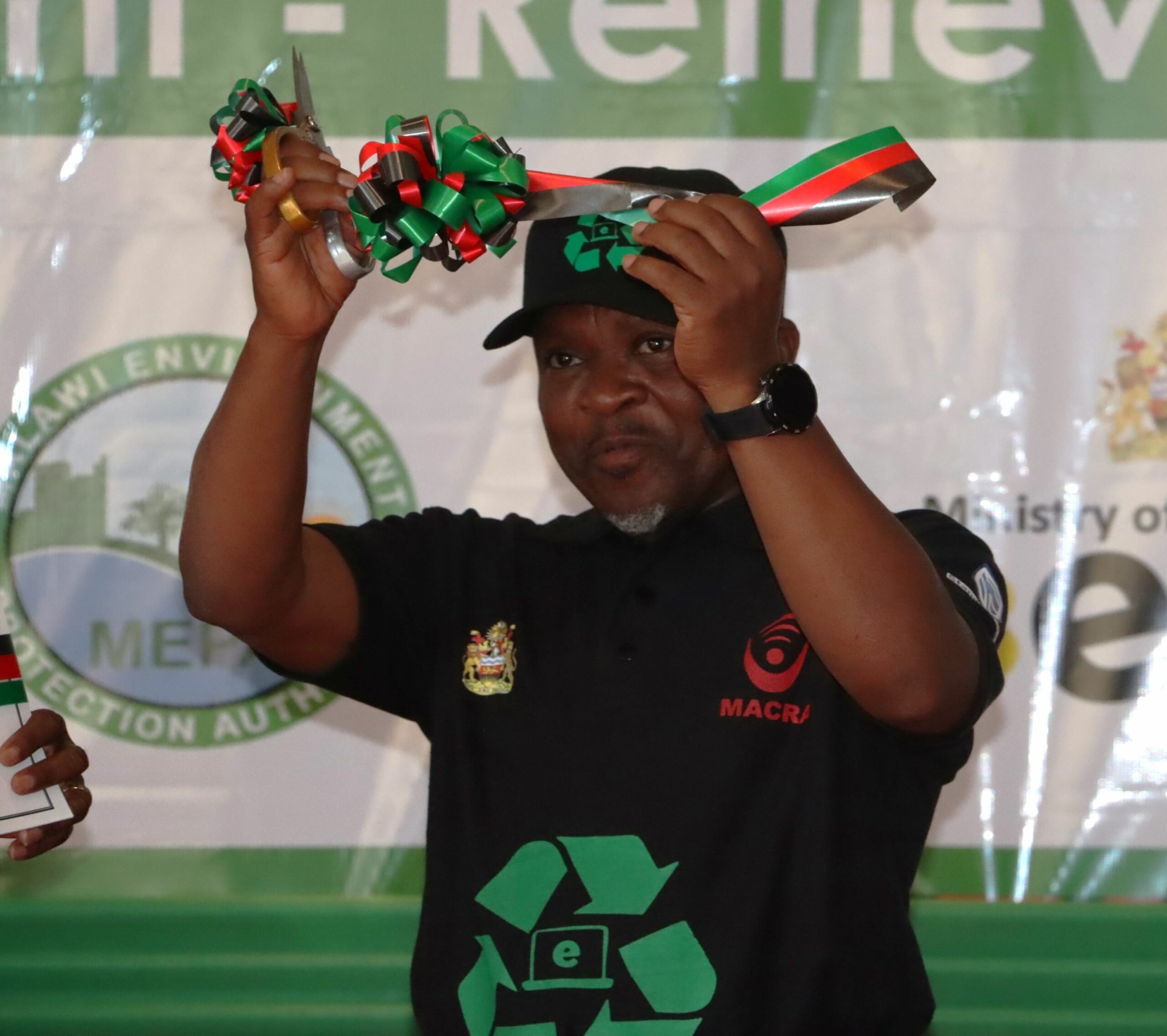 usi raises the ribbon high to mark official launch of the nation e waste management policy pic. by kondwani magombo mana scaled