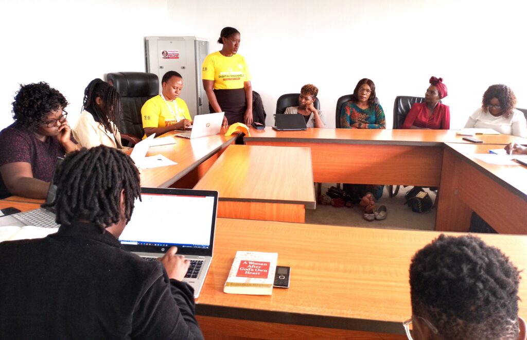 Women in Business urged to embrace digital financing system 1 Women listening to a presentation