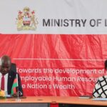 Labour Minister addressing the public