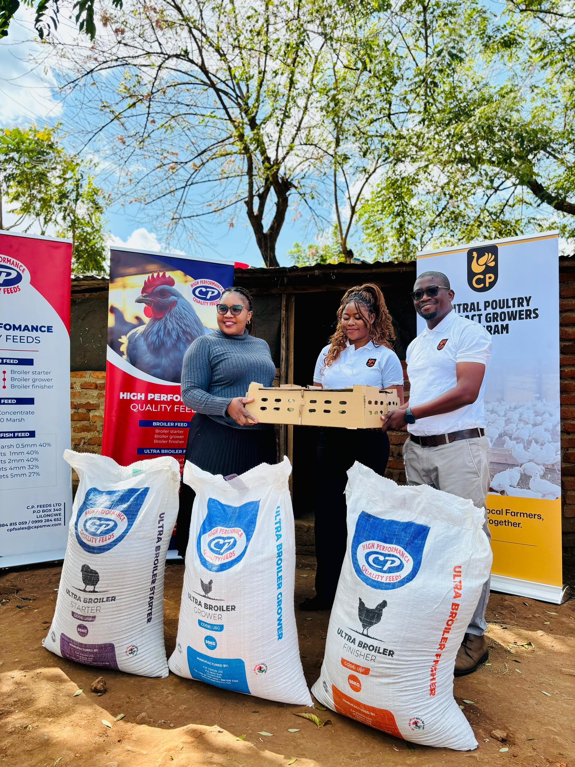 Makwakwa handing over the chicks to a representative of the poultry farmers in Lilongwe